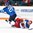 KAMLOOPS, BC - APRIL 4: Finland's Sari Karna #20 makes contact with Russia's Alexandra Kapustina #44 during bronze medal game action at the 2016 IIHF Ice Hockey Women's World Championship. (Photo by Matt Zambonin/HHOF-IIHF Images)


